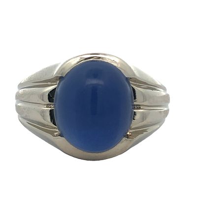 Faux Star Sapphire Ring. S/6.9-NYS 
This striking ring features a prominent oval-shaped cabochon 