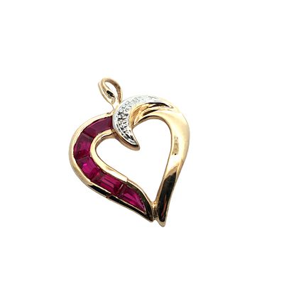 Ruby Heart Pendant. S/1.7-MOY 
This charming heart-shaped pendant is beautifully crafted in warm 