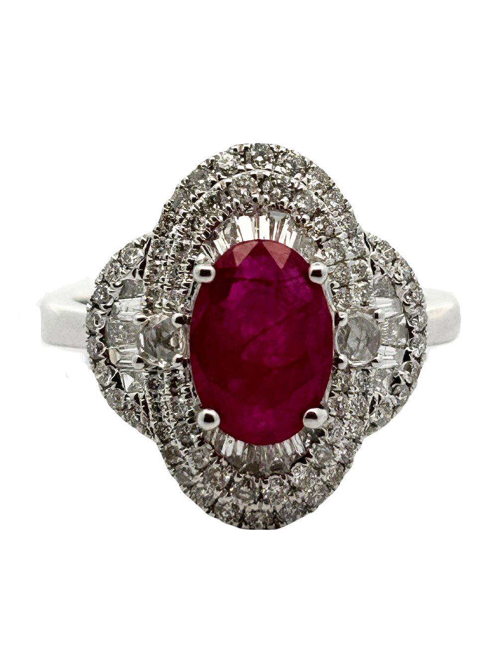 18K Ruby & Diamond Ring. CJI1962/12-OAKM 
This magnificent ring, crafted in 18k white gold, is a 