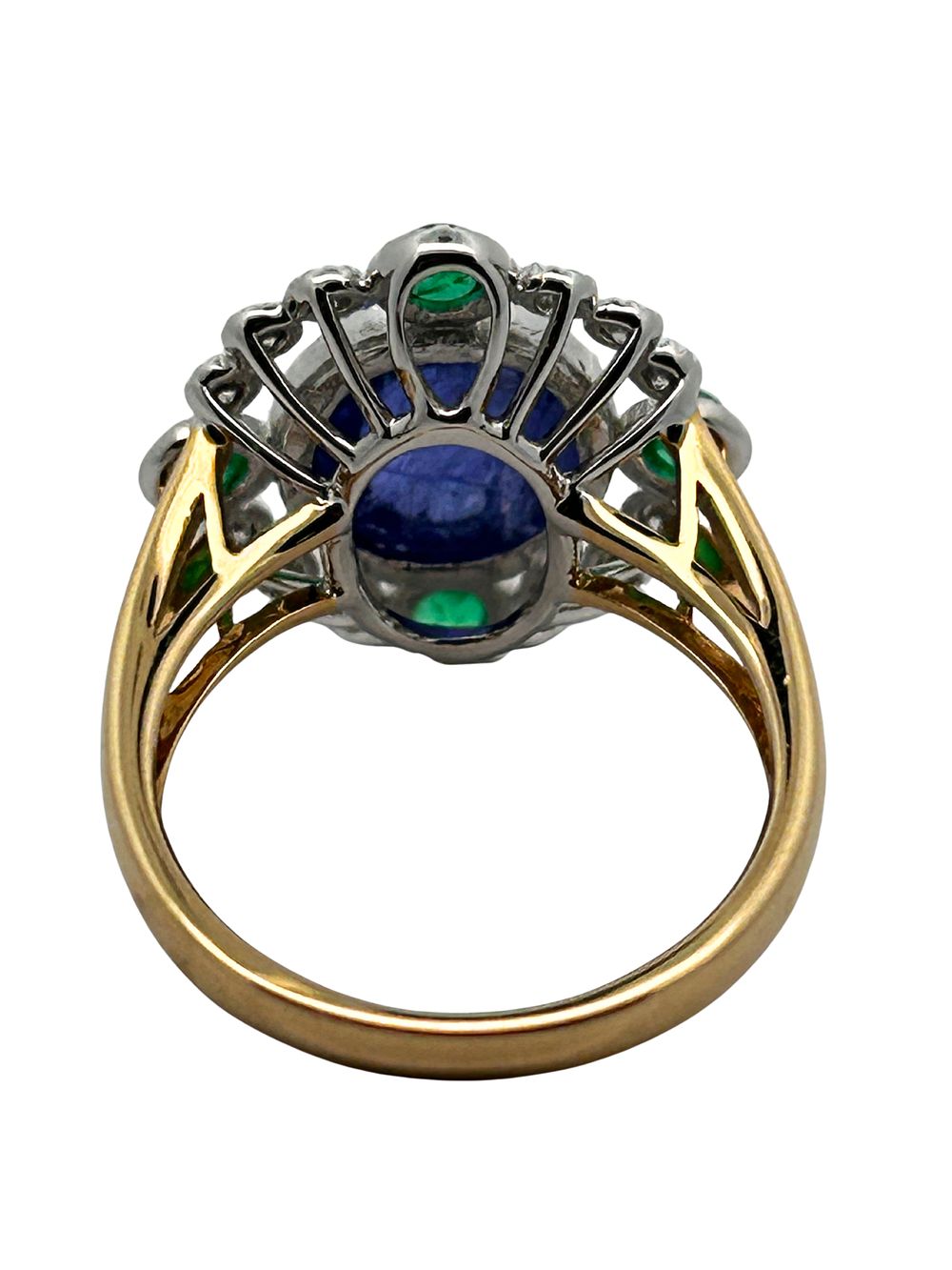 Tanzanite, Emerald & Diamond Ring. CJI1962/4-MSTS 
This exquisite ring features a substantial 