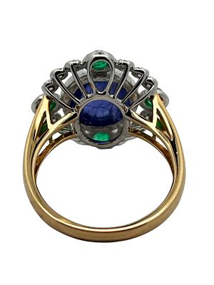 Tanzanite, Emerald & Diamond Ring. CJI1962/4-MSTS 
This exquisite ring features a substantial 
