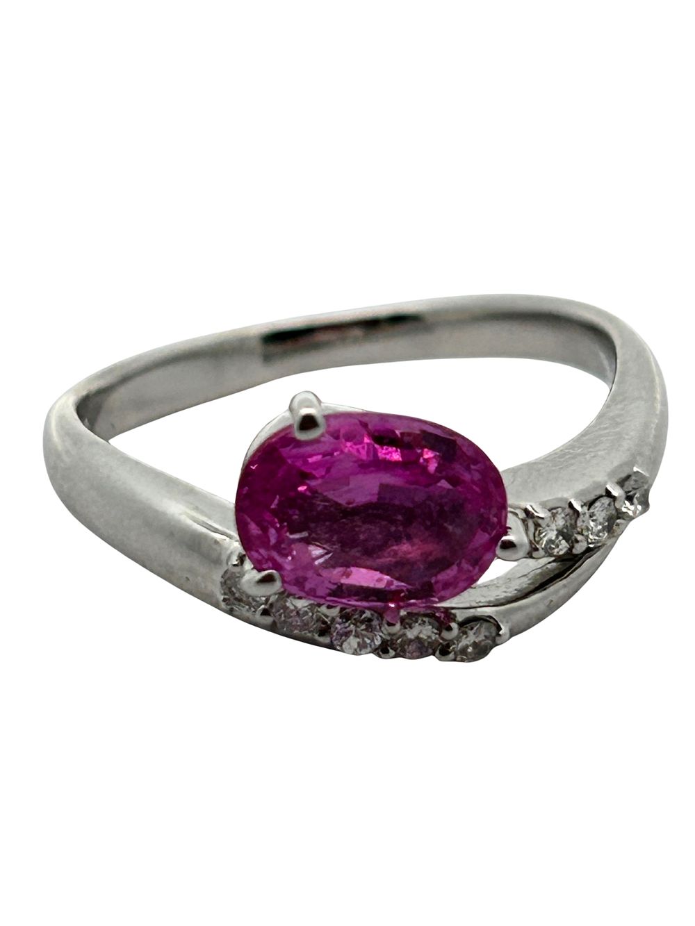 Platinum Pink Sapphire & Diamond Ring. CJI1962/6-MNLO 
This elegant platinum ring showcases a 