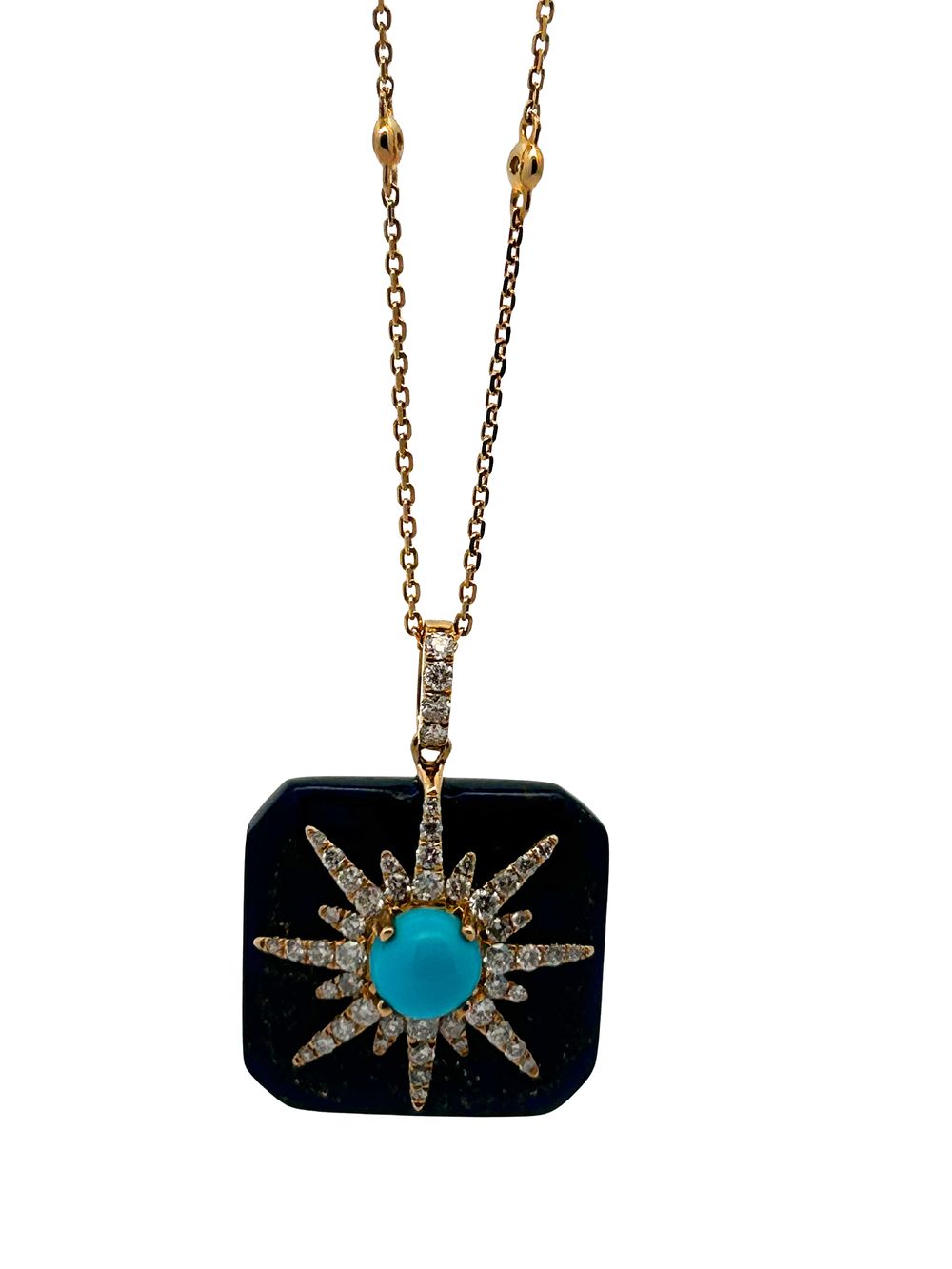Lapis, Turquoise & Diamond Pendant Necklace. CJI1962/27-KOA 
This striking pendant necklace 