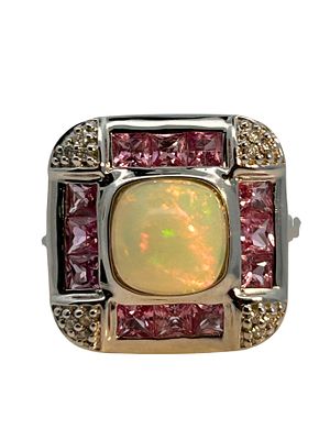 Opal, Pink Sapphire & Diamond Ring. CJI1962/16-MMAO 
This striking ring showcases a luminous 