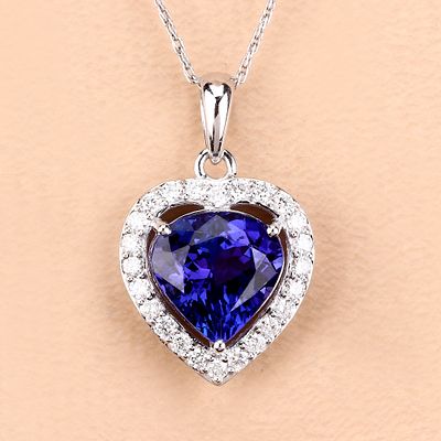Tanzanite & Diamond Halo Pendant. Q8415/20 - MNAY
An absolutely breathtaking piece, this 