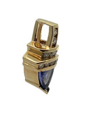 14K Tanzanite & Diamond Pendant. S/3.5-ESS 
This exquisite 14K yellow gold pendant showcases a 