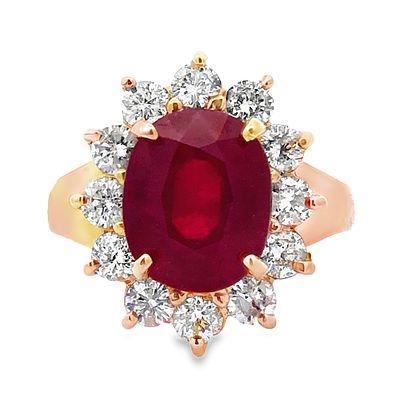 Ruby Diamond Halo Ring. AF6947/35-KTN 
This breathtaking ring features a prominent oval-cut ruby 