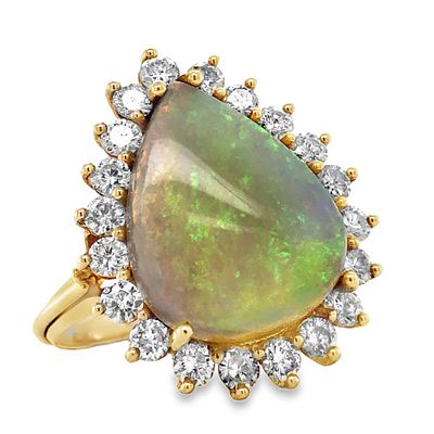 Pear-Shaped White Opal & Diamond Halo Ring. S/8.2-MYYS 
An elegant statement of vintage-inspired 