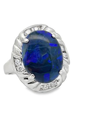 Diamond and Black Opal Ring. S/9-LSS 
Commanding attention, this magnificent ring features a 