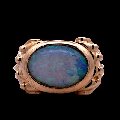 14K Jelly Opal Ring. S/8.2-AYS 
This striking ring features a beautiful oval-cut jelly/water 