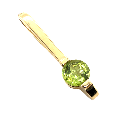 Peridot Pendant. S/1.1-mms 
A striking and elegant pendant featuring a vibrant round-cut natural 