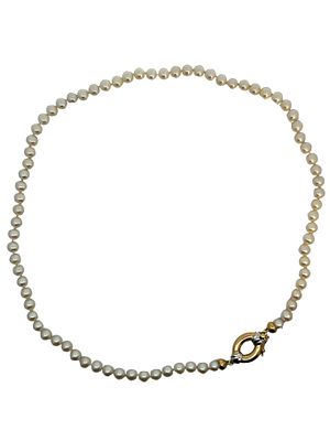 18" Freshwater Pearl Strand Necklace. A timeless strand of luminous white freshwater pearls 