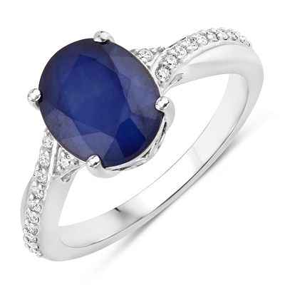 Blue Sapphire and Diamond Ring. QJ8423/22-MSOE 
Graceful and luminous, this captivating ring 