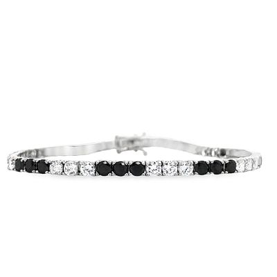 CZ and Black Onyx Tennis Bracelet . S/7.5-TYS 
This striking piece is a tennis bracelet crafted 