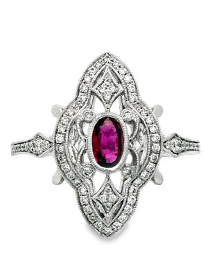18K Ruby & Diamond Ring. E7614/5-LKK 
Radiating a classic, regal charm, this 18k gold ring 