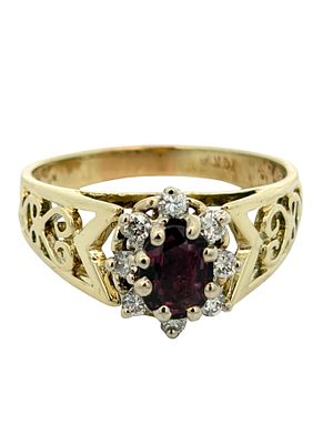 14K Sapphire & Diamond Ring. Experience the timeless allure of this 14k gold ring, featuring a 