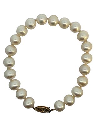 Pearl Bracelet. This classic and elegant bracelet features a continuous strand of uniformly 