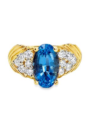 14K Blue Topaz & Diamond Ring. S/7.44-LSS 
This exquisite 14K yellow gold ring features a 