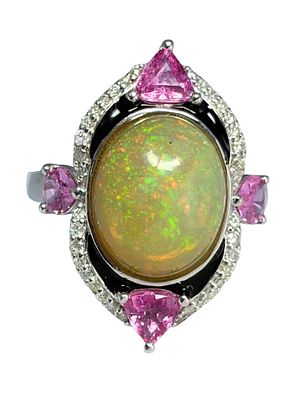 Platinum Opal, Sapphire & Diamond Ring. E7614/13-KNE 
Harnessing the ethereal glow of a premium 