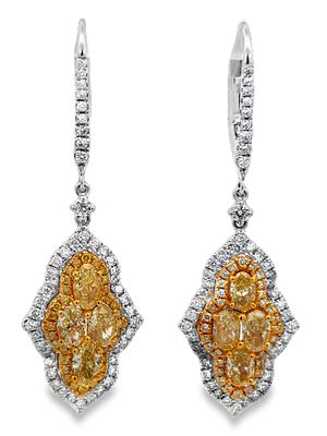 18K Two Tone Fancy Yellow Diamond Earrings. CJI4693/18-NNOM 
These 18K two-tone gold halo 