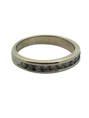 14K Diamond Band Ring. This elegant and timeless rhodium plated 14K white gold ring features a 