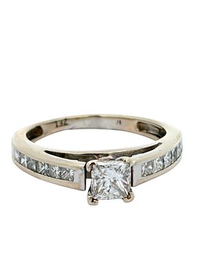 14K Princess Cut Diamond Engagement Ring. This timeless 14K white gold engagement ring features 