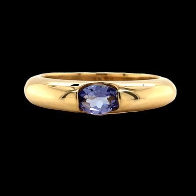 Tanzanite Ring. S/4.4-ESS A minimalist yet striking ring featuring a captivating oval-cut 