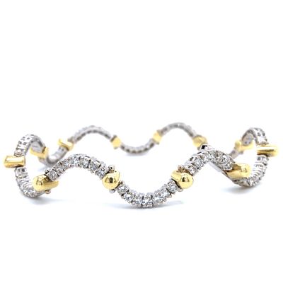 2.5 CTW Diamond Fancy-Design Tennis Bracelet 18K. S/18.5- YSSS 
This is an 18 karat yellow and 