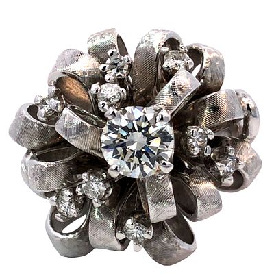 Diamond Dress Ring. S/12.5-MESS 
A breathtaking example of avant-garde goldsmithing, this dress 