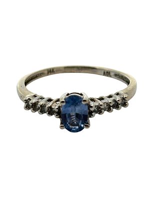 14K Ceylon Sapphire & Diamond Ring. This elegant 14K white gold ring features a vibrant oval-cut 