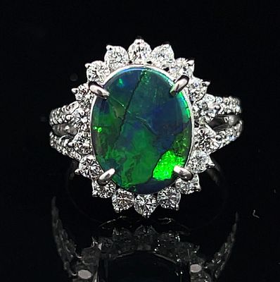 Platinum Black Opal & Diamond Ring. ISL2418/18-OTSS 
A striking statement ring featuring a 