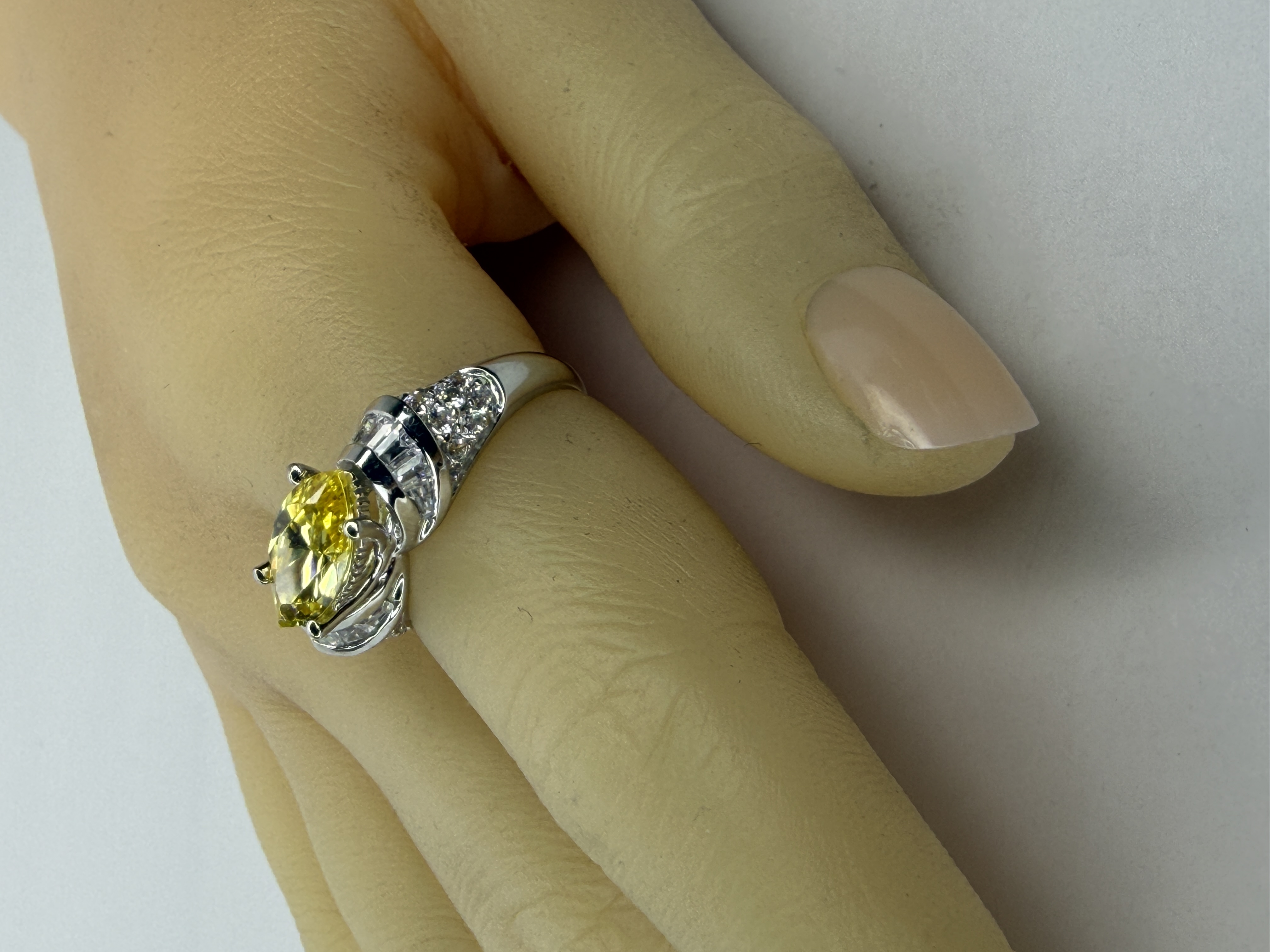 Yellow and White CZ East to West Ring