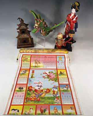DECORATIVE ASIAN THEMED ITEMS 
Geisha doll, pagoda, painted wooden dragon, child dolls, four 