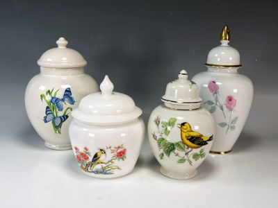 4 CERAMIC URN FORM JARS WITH LIDS LEFTON 
Flowers, birds, and butterflies. Marks include Lefton 