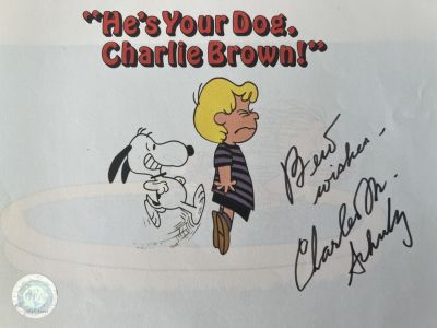 Peanuts Charles Schulz signed book page GFA authenticated. 7x8 inches