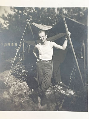Man and tent vintage photo. 2x3 inches