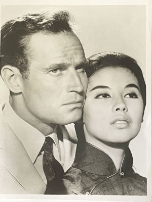 Charlton Heston and France Nuyen unsigned photo. 8x10 inches
