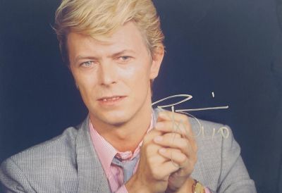 David Bowie signed photo. 12x9 inches