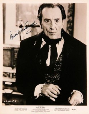 Basil Rathbone signed movie still photo. 8 in. by 10 in. Black and white movie still photo from 