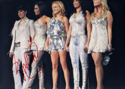 The Spice Girls Sporty Spice Mel C signed photo. The Spice Girls signed photo autographed by 