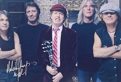 AC/DC Malcolm Young signed photo.12x9 inches
