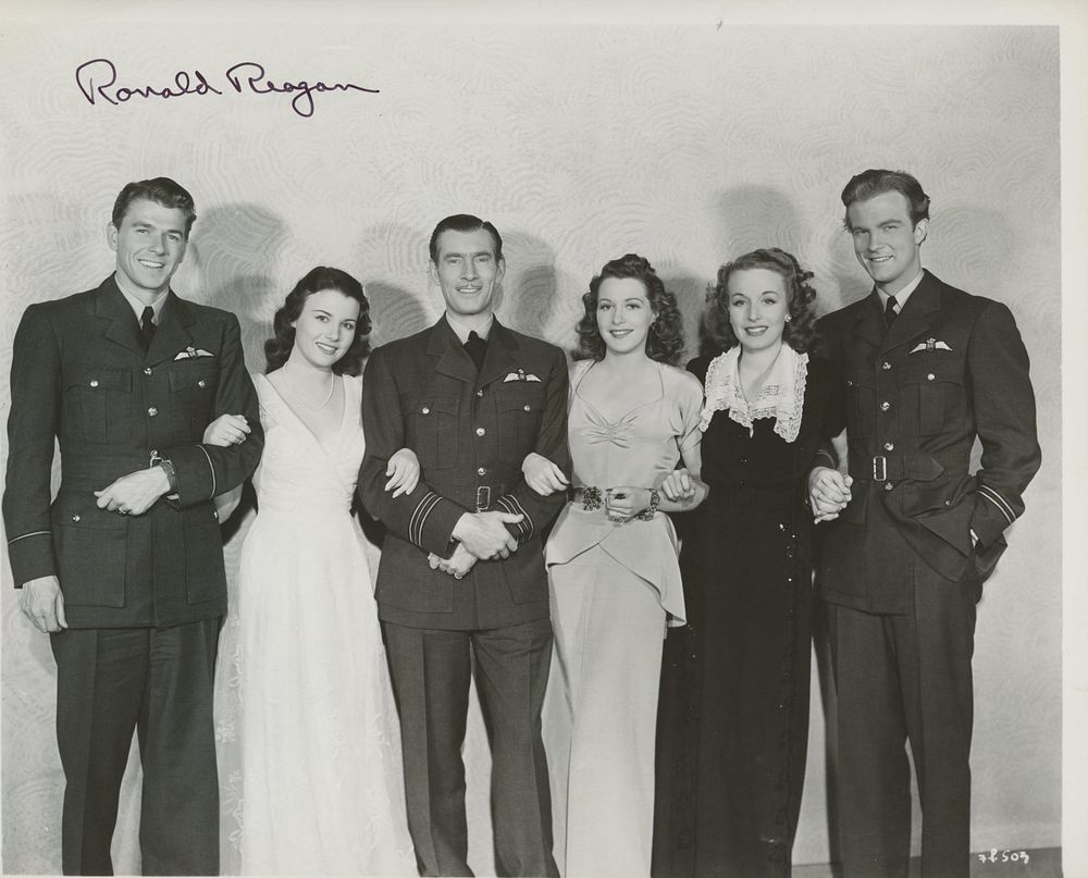 Ronald Reagan signed movie photo. GFA Authenticated. International Squadron signed movie photo 