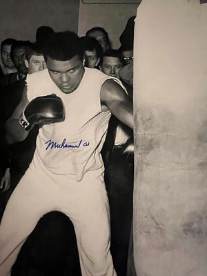 Muhammad Ali signed photo. 8x10 inches