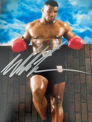 Mike Tyson signed photo. 8x10 inches