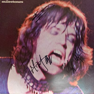 The Rolling Stones Milestones signed album. GFA Authenticated. The Rolling Stones Milestones