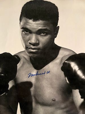 Muhammad Ali signed photo. 8x10 inches