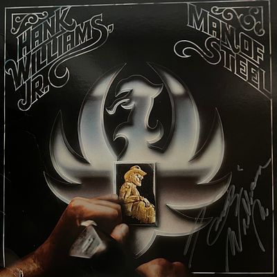 Hank Williams Jr Man Of Steel signed album. 12x12 inches vinyl included