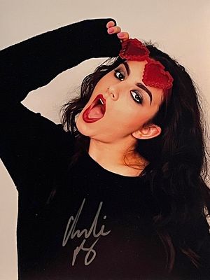 Charli XCX signed photo. 8x10 inches