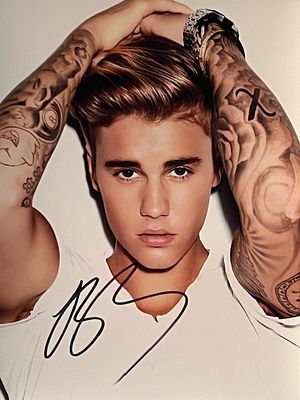 Justin Bieber signed photo. 8x10 inches