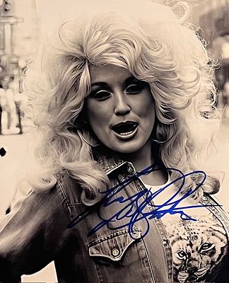 Country Singer Dolly Parton signed photo. 8x10 inches